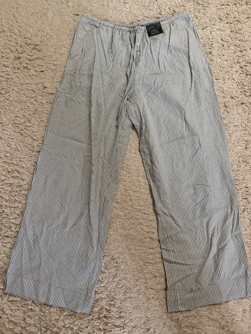 Green and white striped pajama pants